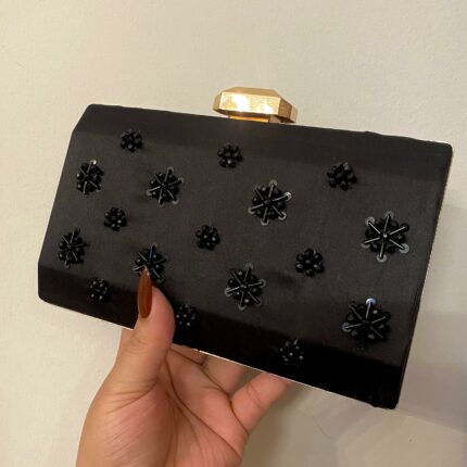 black hand embroiderd clutch for her