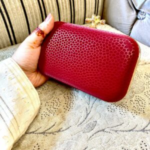 red clutch for her