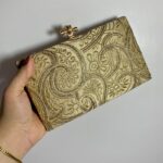 Golden Clutch With Silver Work