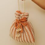 Light Pink Potli With White Pearls For Her