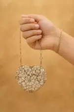 Everglow Heart Mini Clutch In Golden