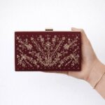 maroon clutch for her