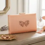 Meadow Bow Clutch In Peach